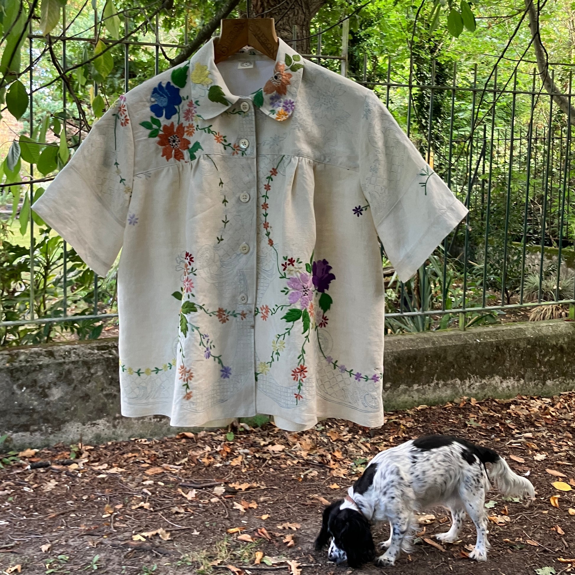 Blouse made from a recycled part-embroidered vintage linen tablecloth