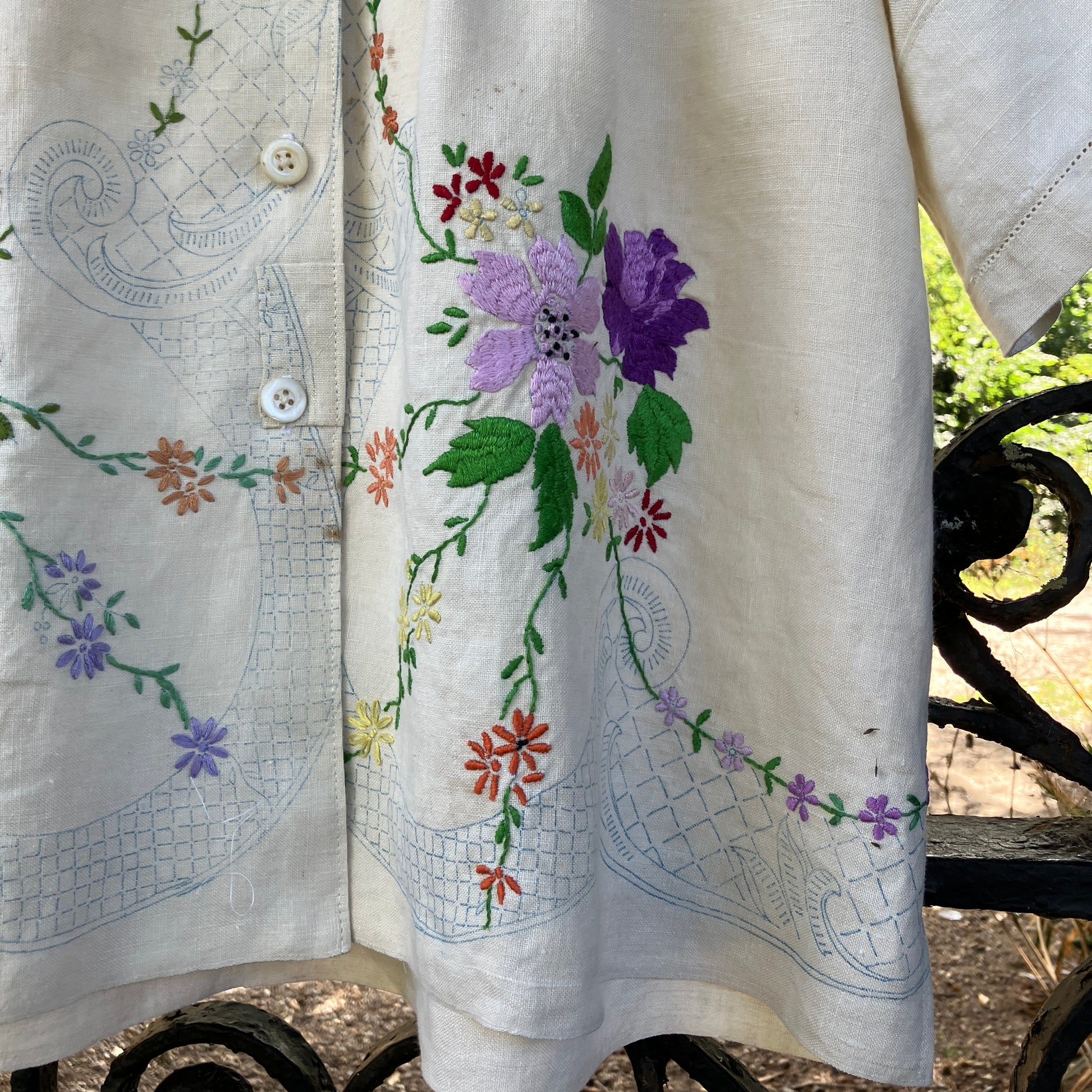 Blouse made from a recycled part-embroidered vintage linen tablecloth