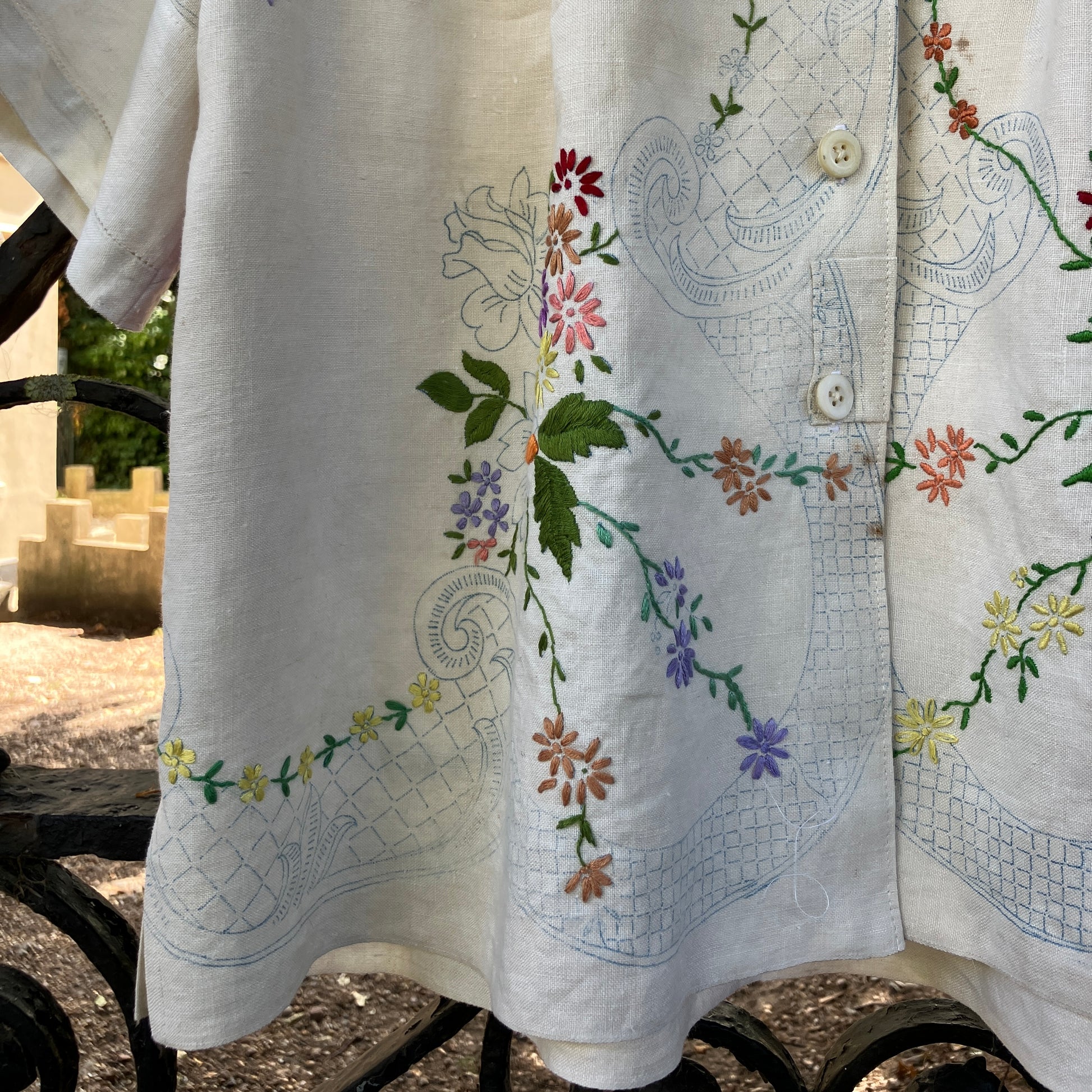 Blouse made from a recycled part-embroidered vintage linen tablecloth