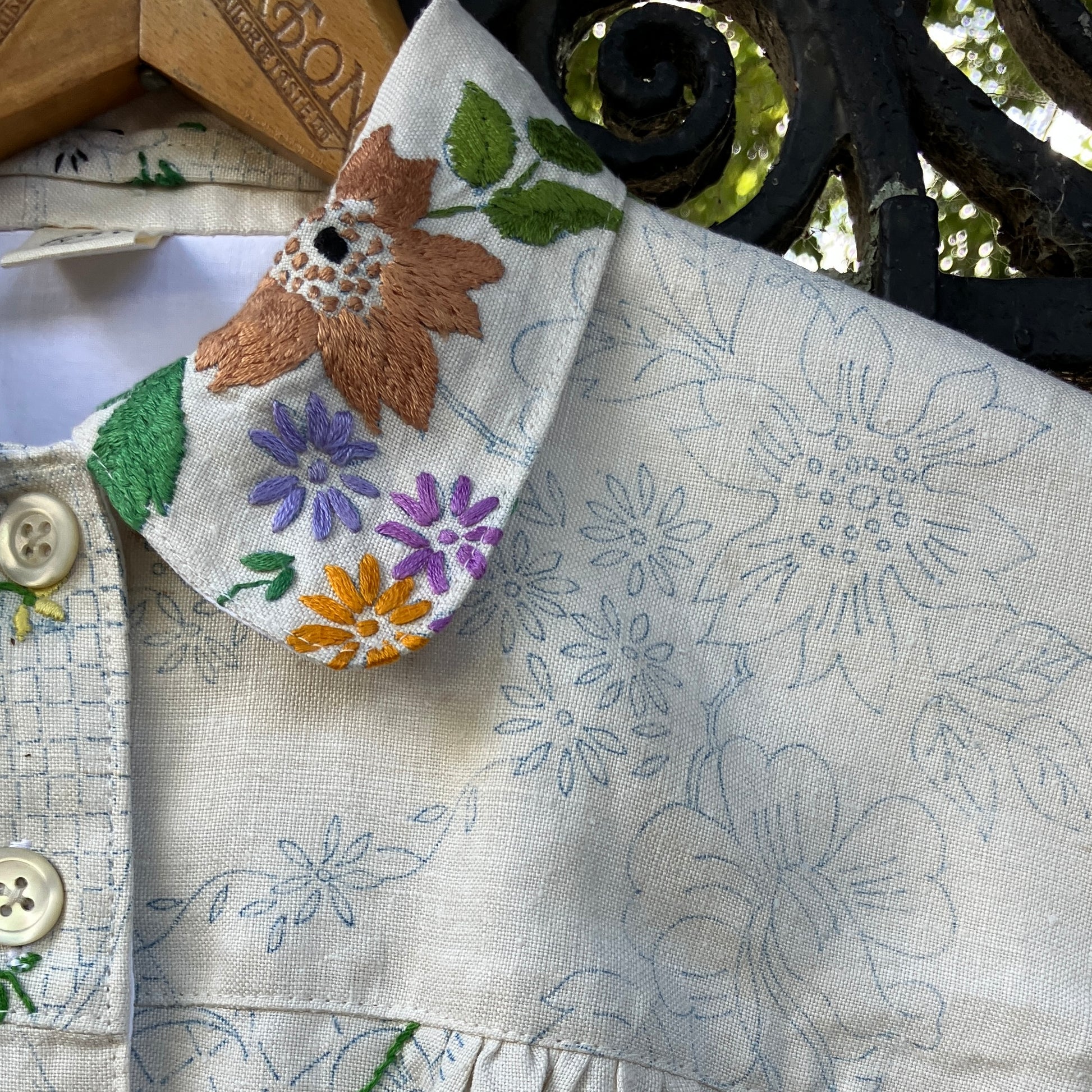 Blouse made from a recycled part-embroidered vintage linen tablecloth