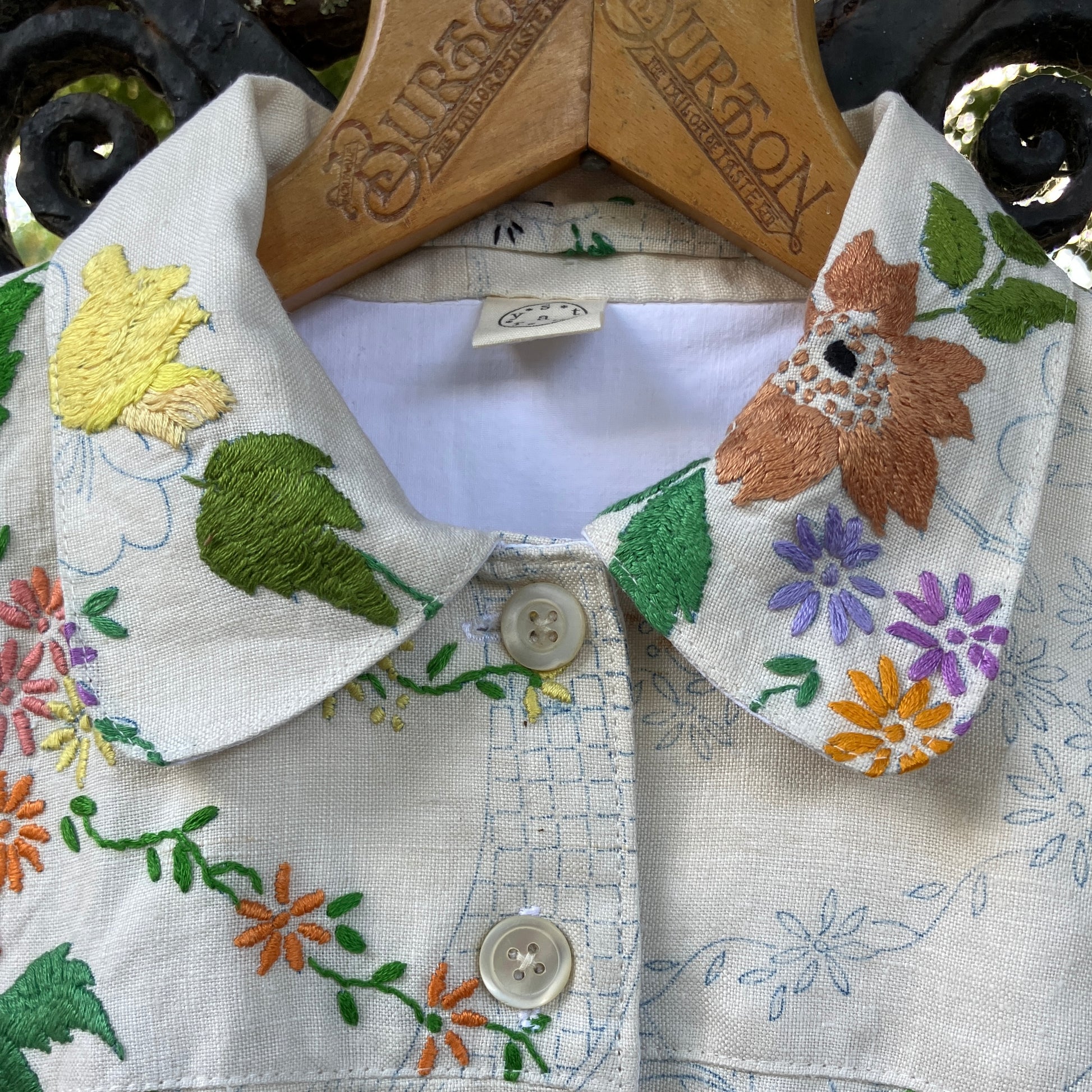 Blouse made from a recycled part-embroidered vintage linen tablecloth