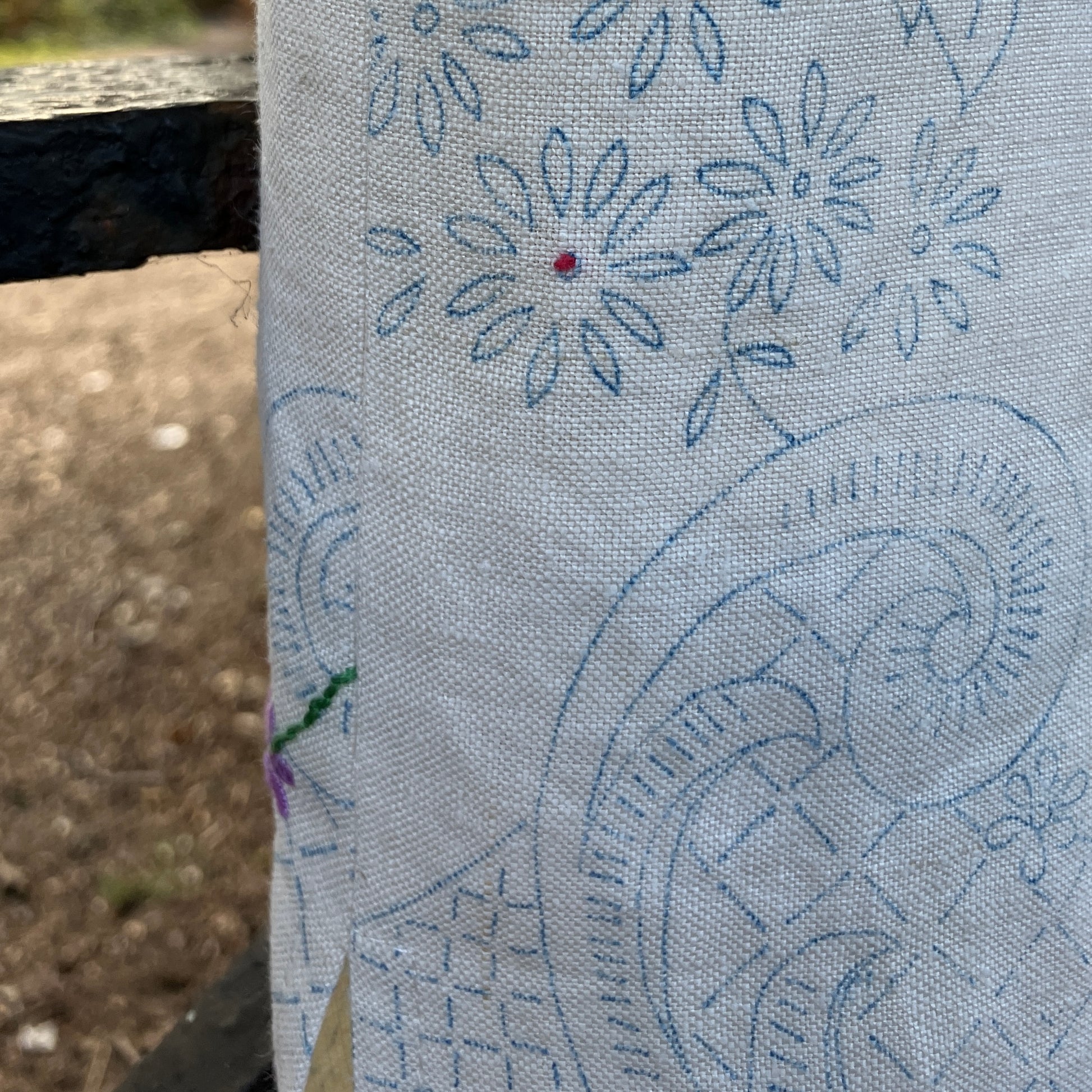 Blouse made from a recycled part-embroidered vintage linen tablecloth