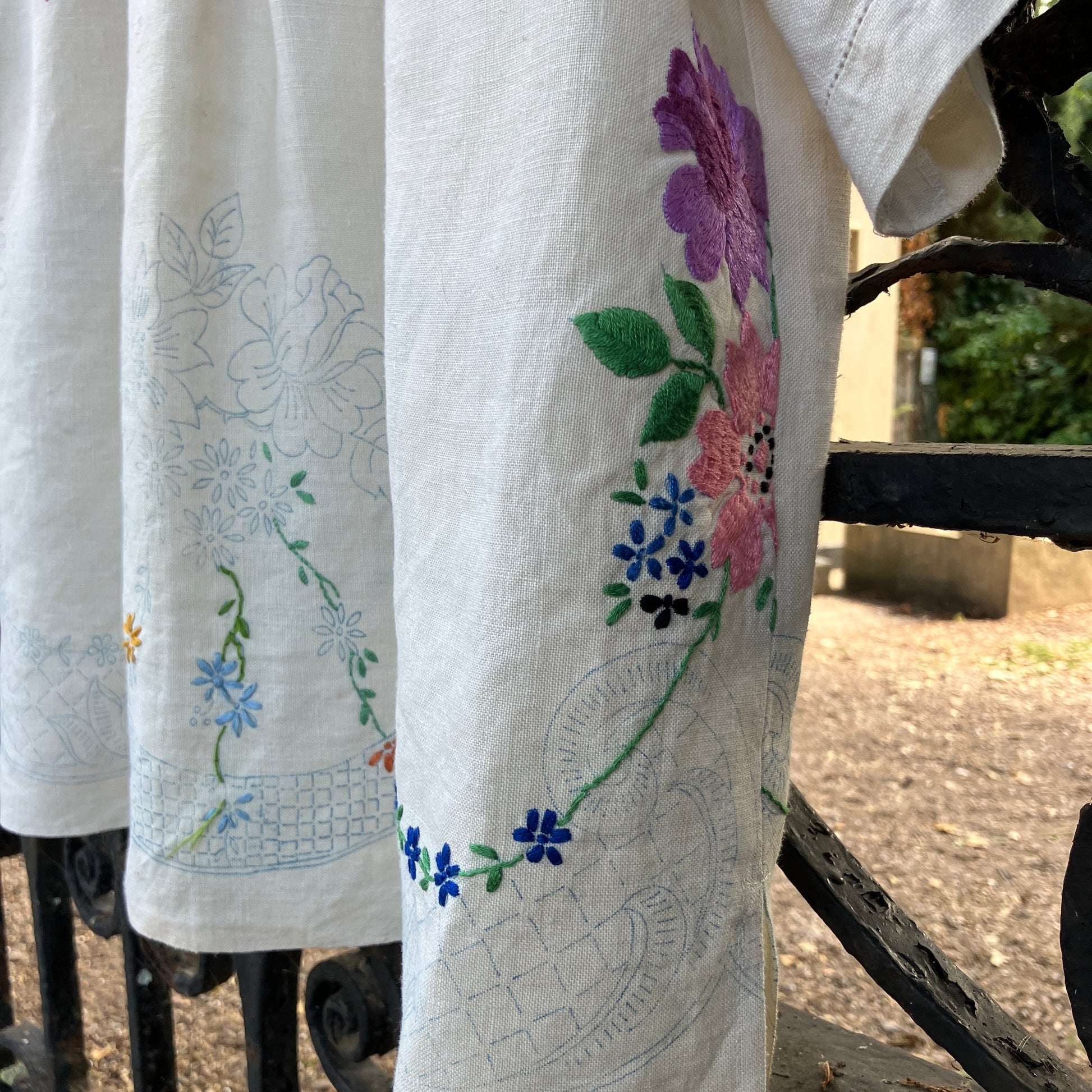 Blouse made from a recycled part-embroidered vintage linen tablecloth