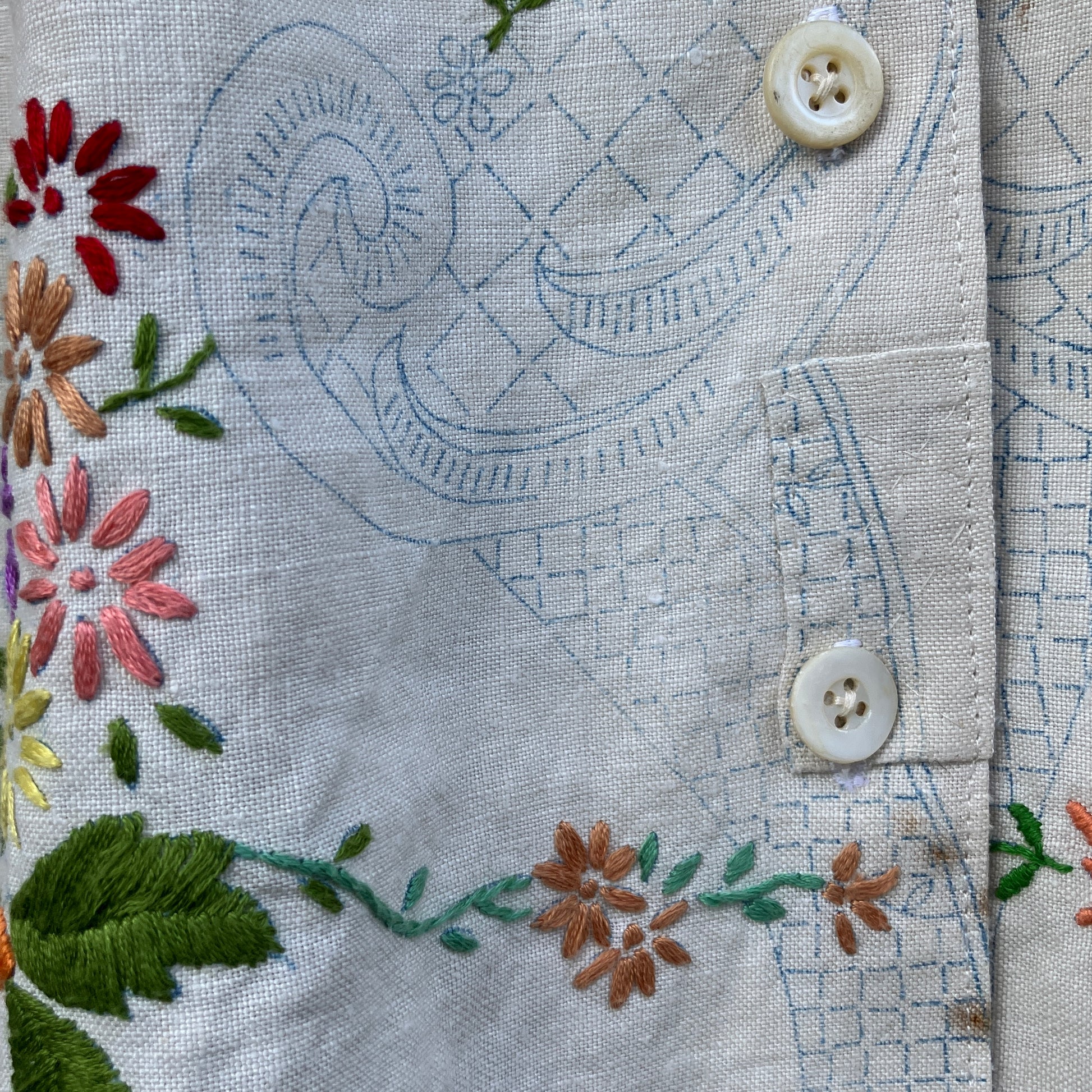 Blouse made from a recycled part-embroidered vintage linen tablecloth