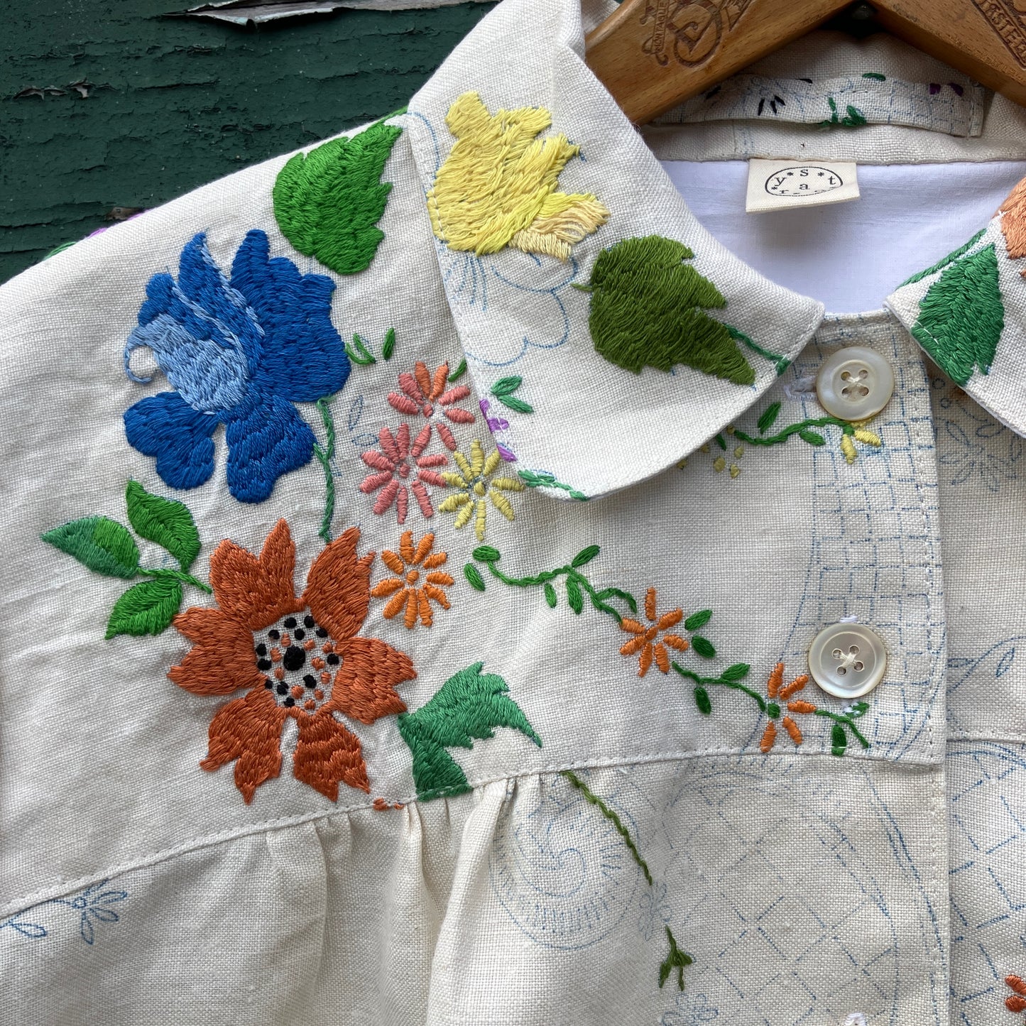 Blouse made from a recycled part-embroidered vintage linen tablecloth