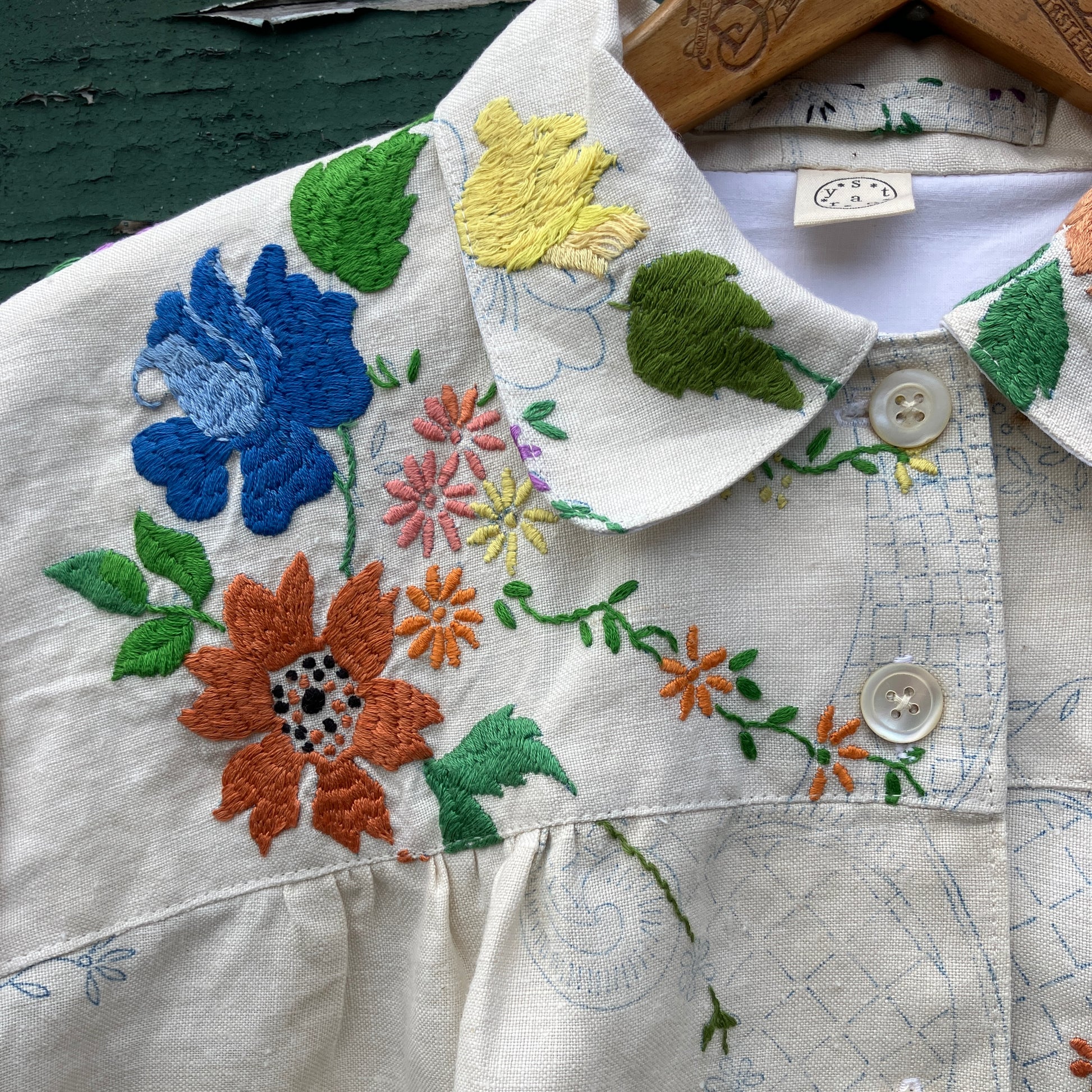 Blouse made from a recycled part-embroidered vintage linen tablecloth