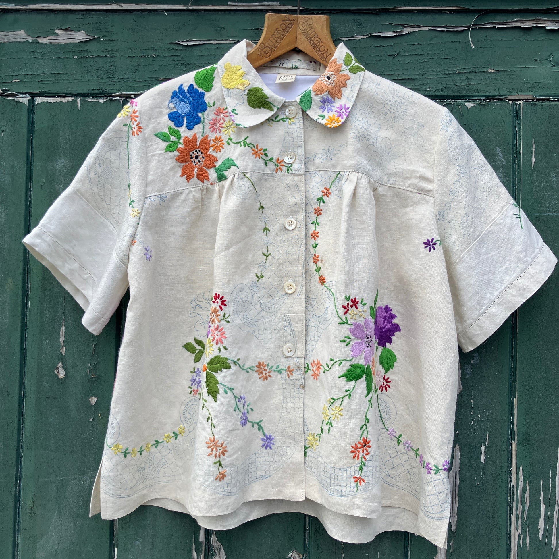 Blouse made from a recycled part-embroidered vintage linen tablecloth