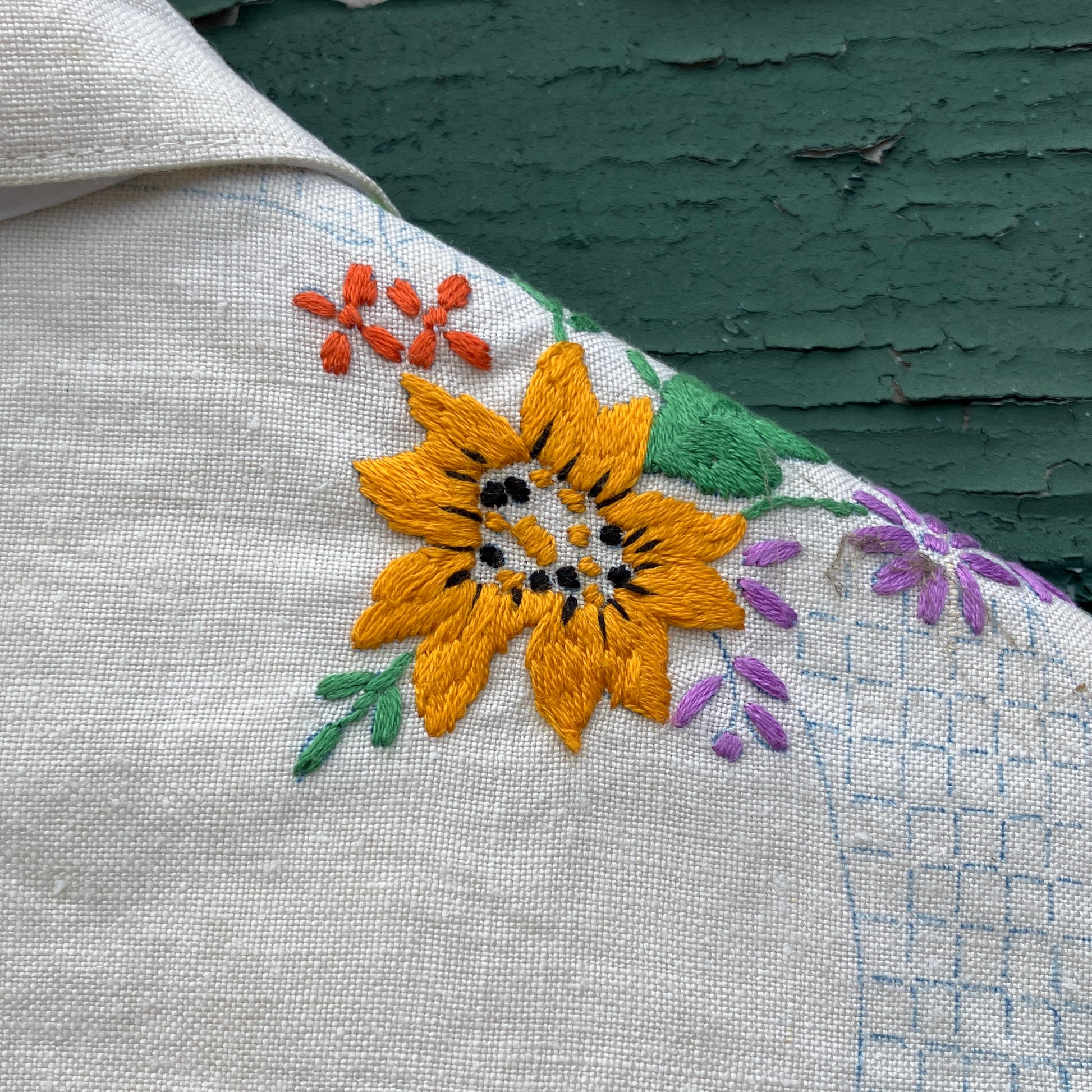 Blouse made from a recycled part-embroidered vintage linen tablecloth