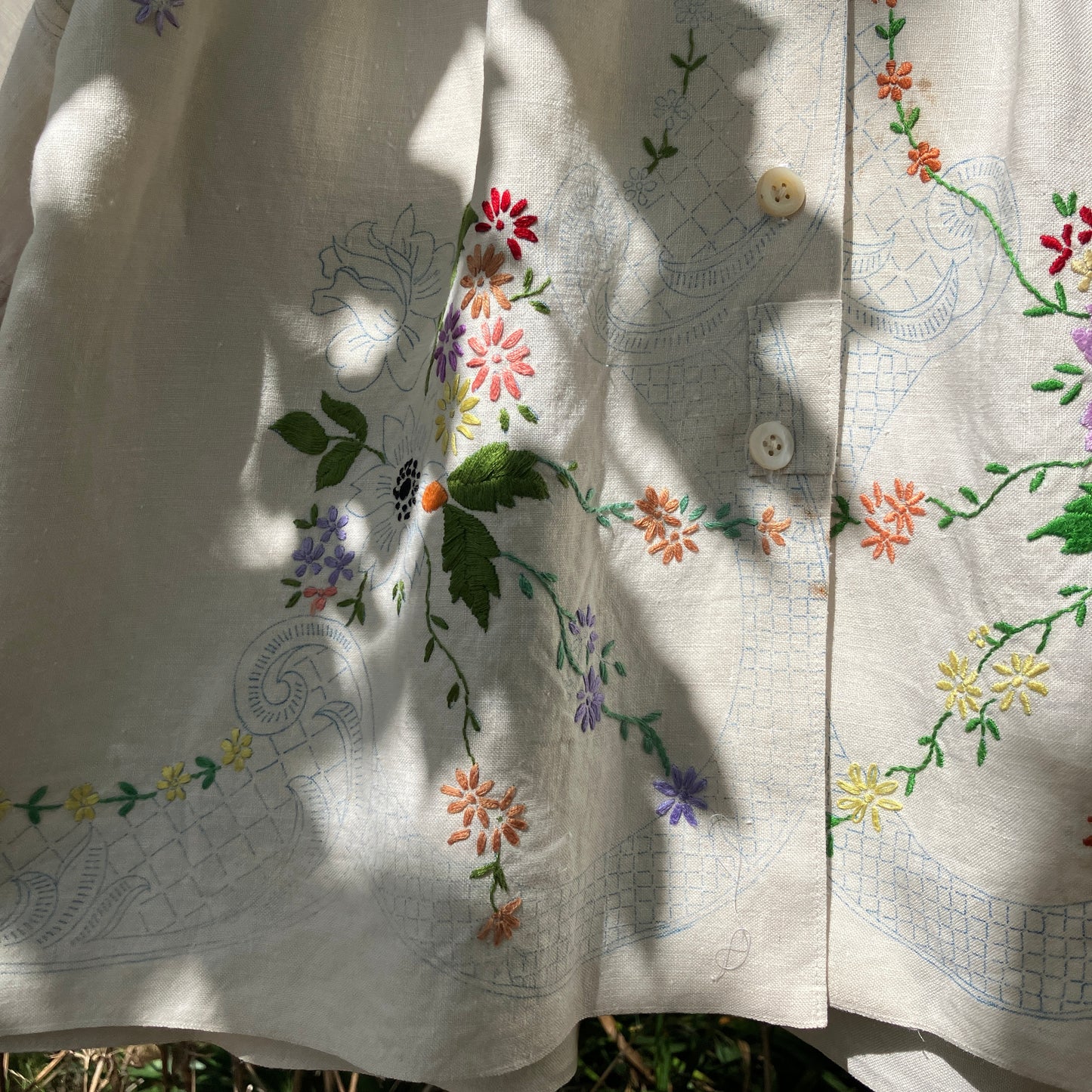 Blouse made from a recycled part-embroidered vintage linen tablecloth