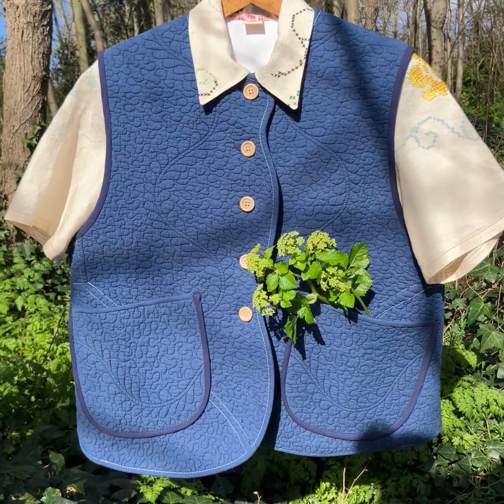 blue vest made from a recycled quilt