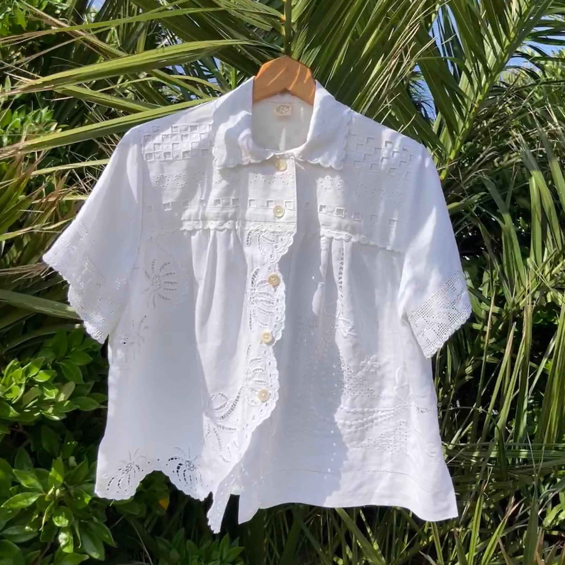 Beautiful shirt made from a patchwork of white reclaimed vintage cotton and linen tablecloths.