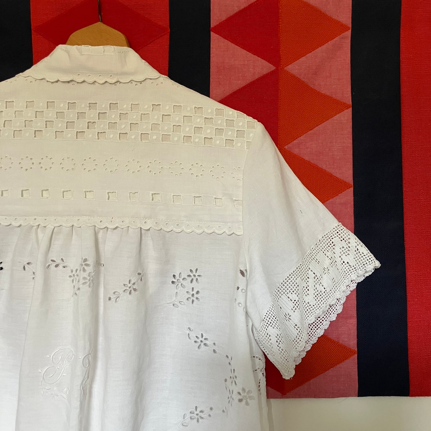 Beautiful shirt made from a patchwork of white reclaimed vintage cotton and linen tablecloths.