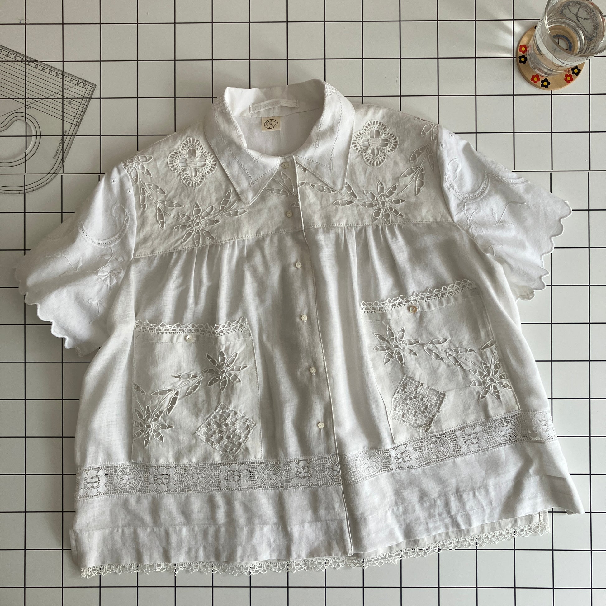 Short-sleeved, swingy shirt made from vintage cutwork linen and cotton cutwork table and tray cloths.