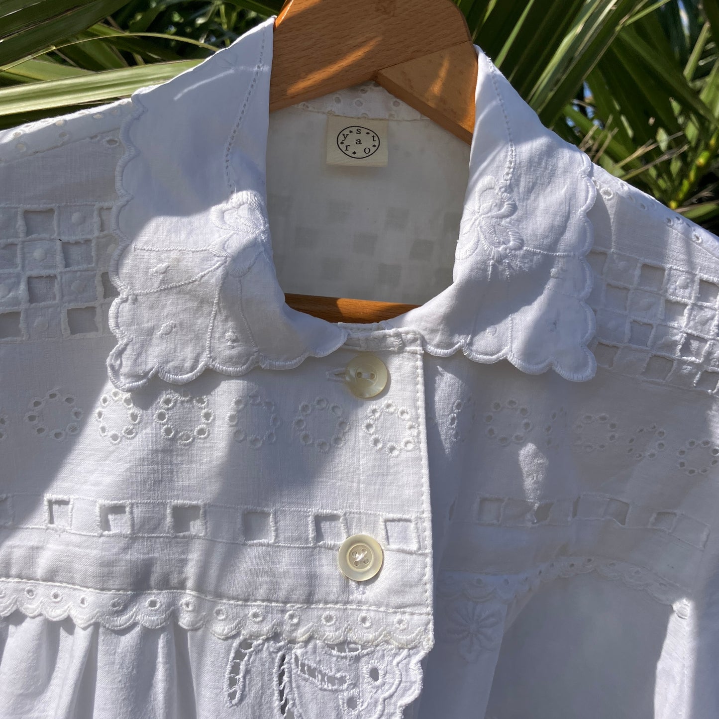 Beautiful shirt made from a patchwork of white reclaimed vintage cotton and linen tablecloths.