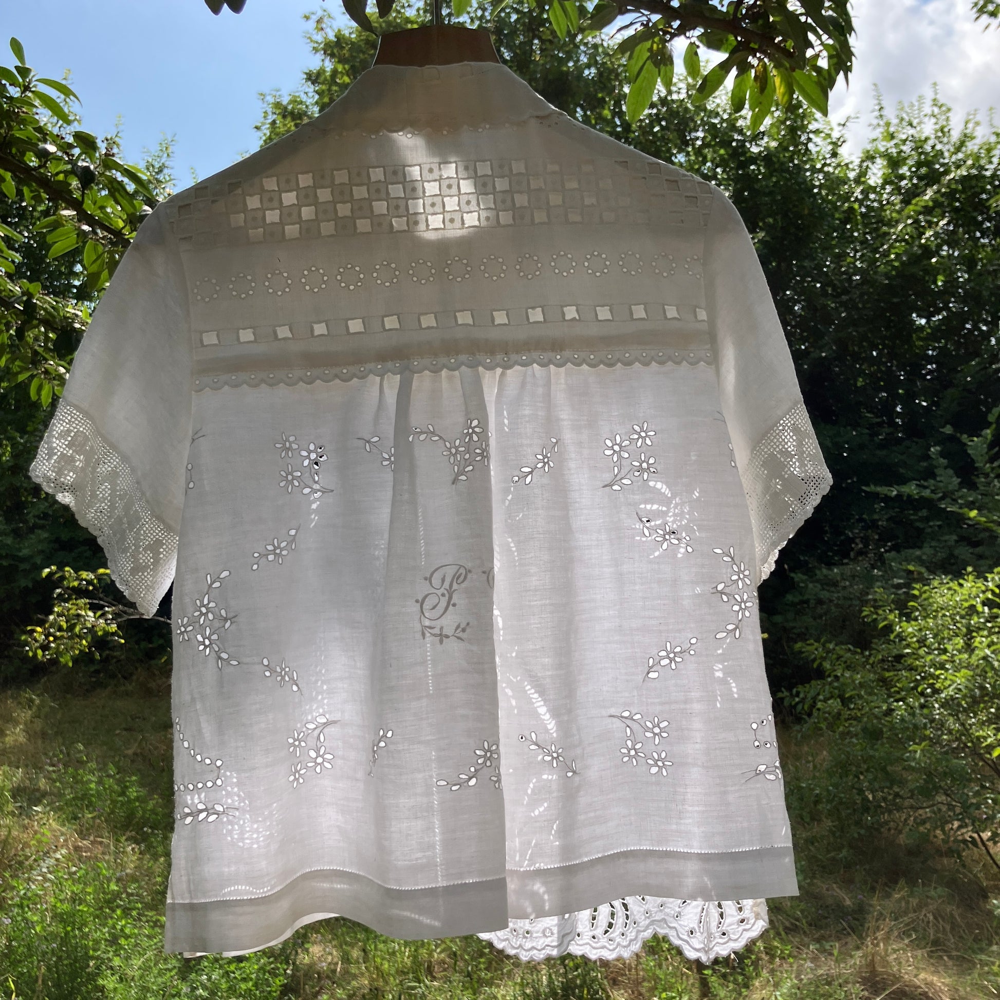 blouse made from a patchwork of vintage white upcycled tablecloths