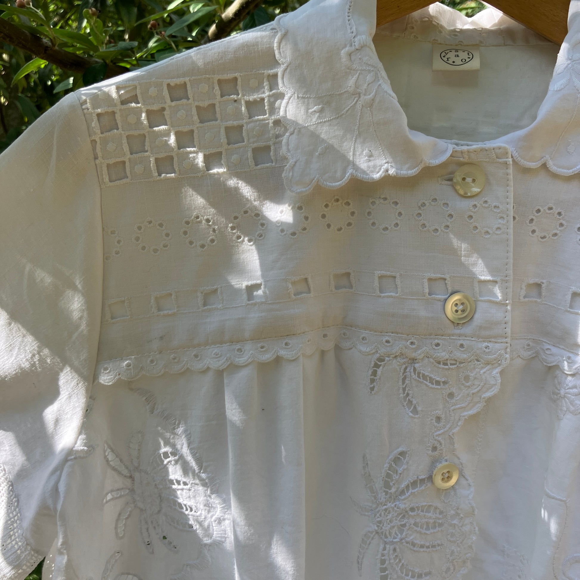 blouse made from a patchwork of vintage white upcycled tablecloths