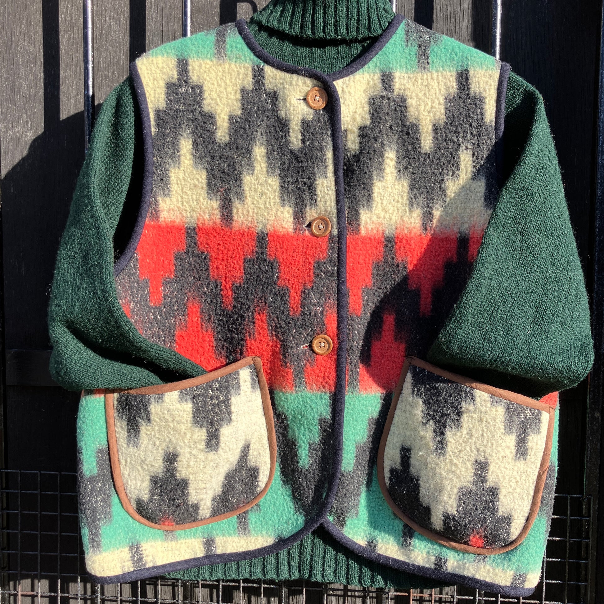 Vest made from a recycled vintage blanket in a zigzag pattern 