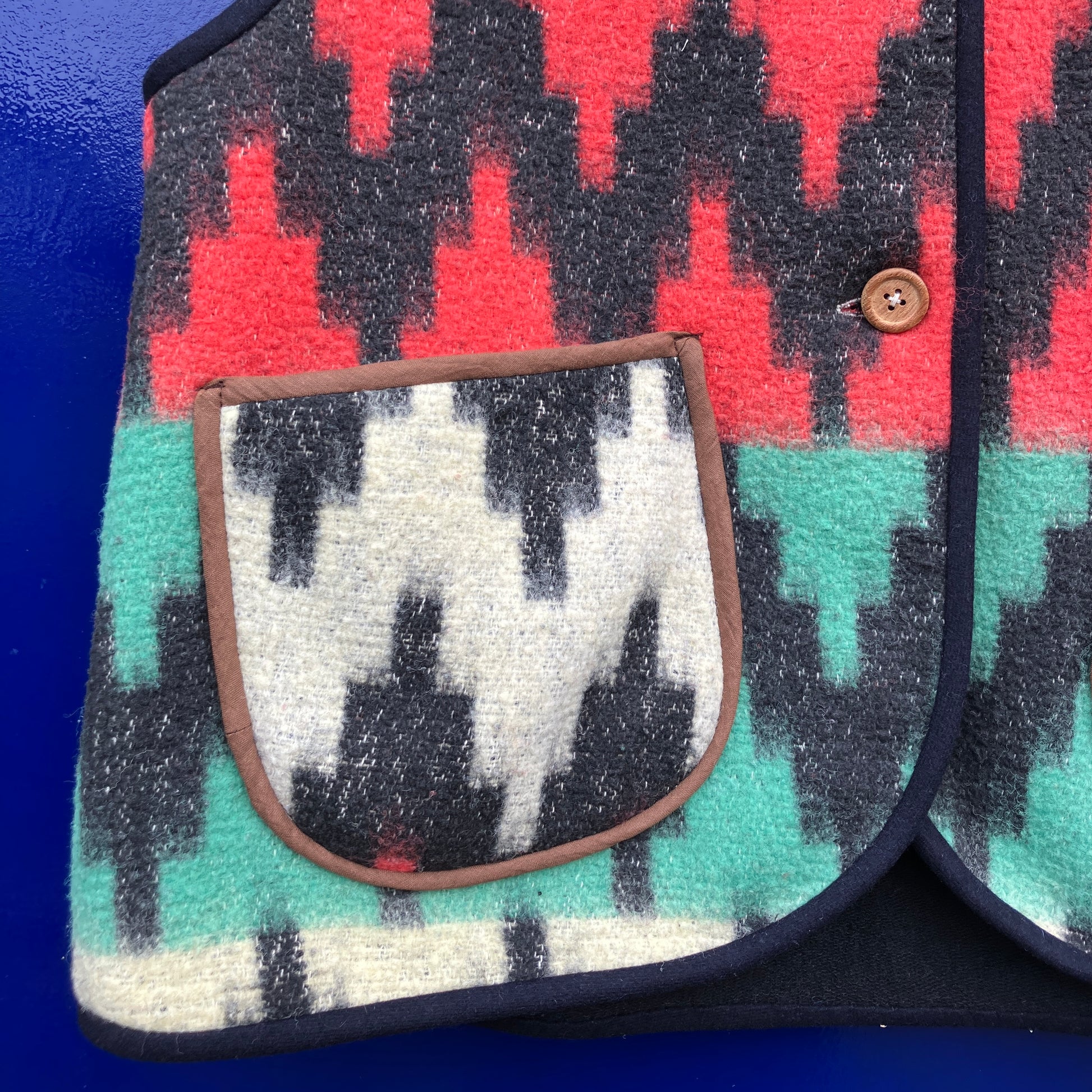 Vest made from a recycled vintage blanket in a zigzag pattern 