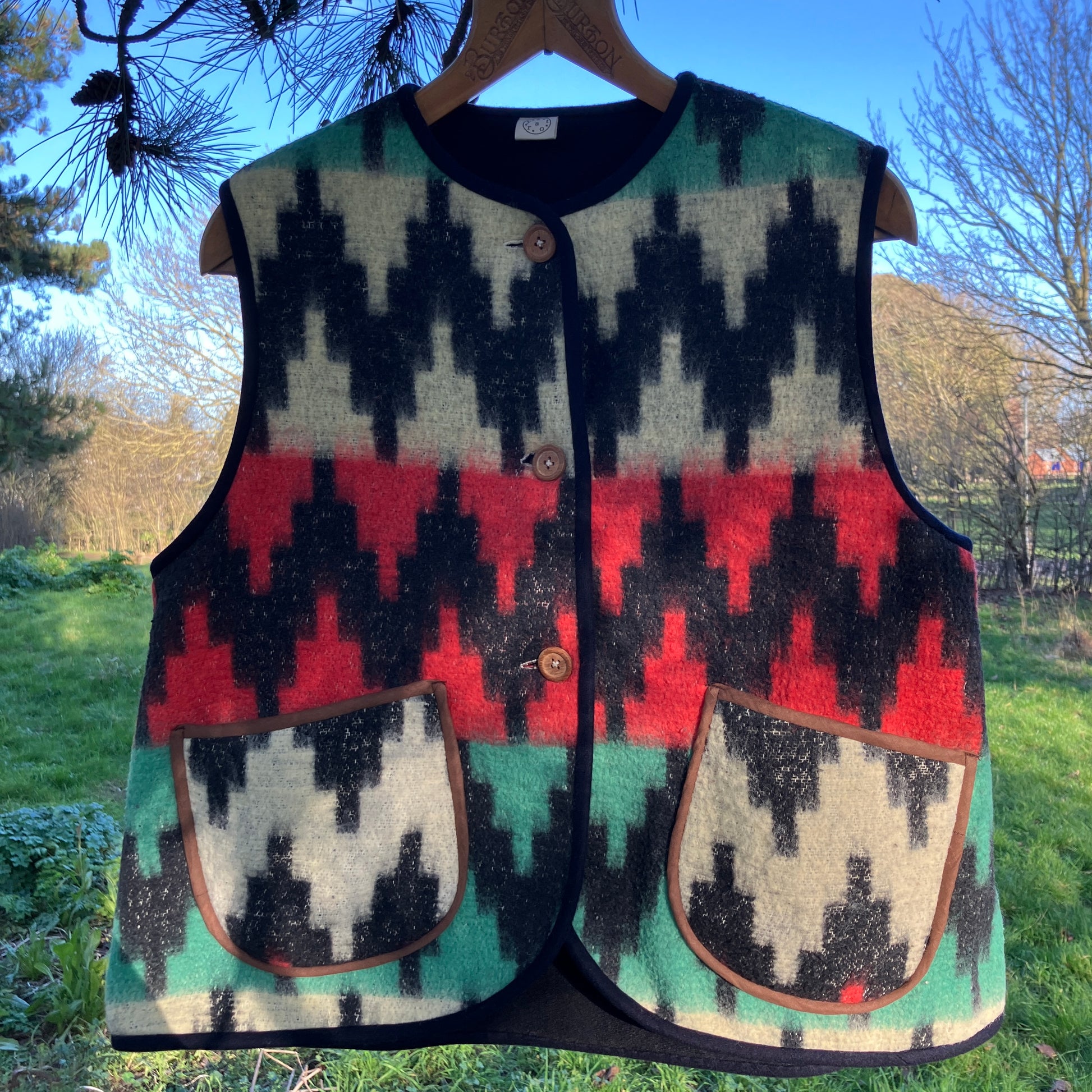 Vest made from a recycled vintage blanket in a zigzag pattern 