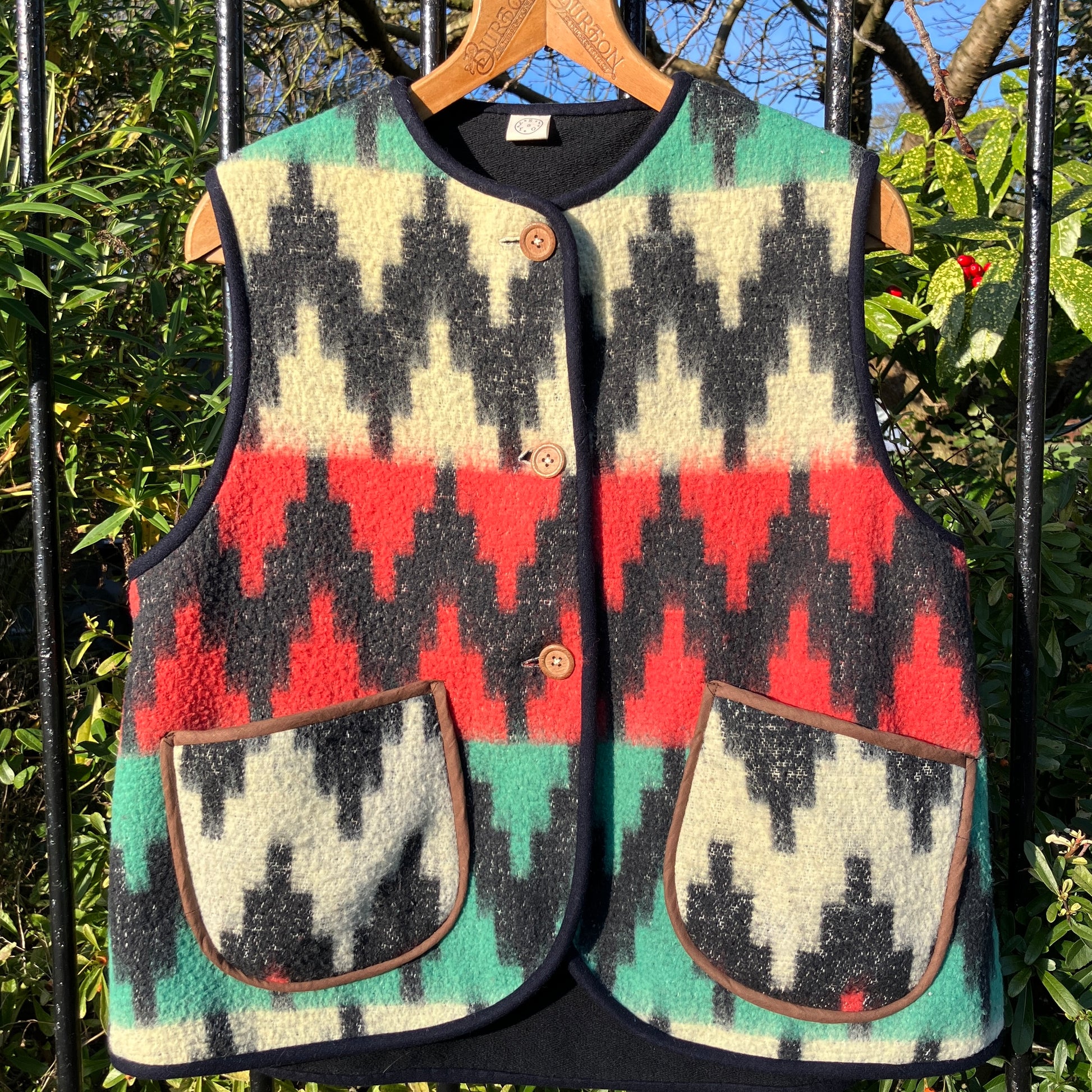 Vest made from a recycled vintage blanket in a zigzag pattern 