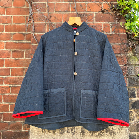 Handmade black recycled quilt jacket