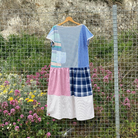 Handmade patchwork dress made from recycled cotton shirts using a vintage 1980s pattern. Boat neck. Pocket on bodice. Drop waist