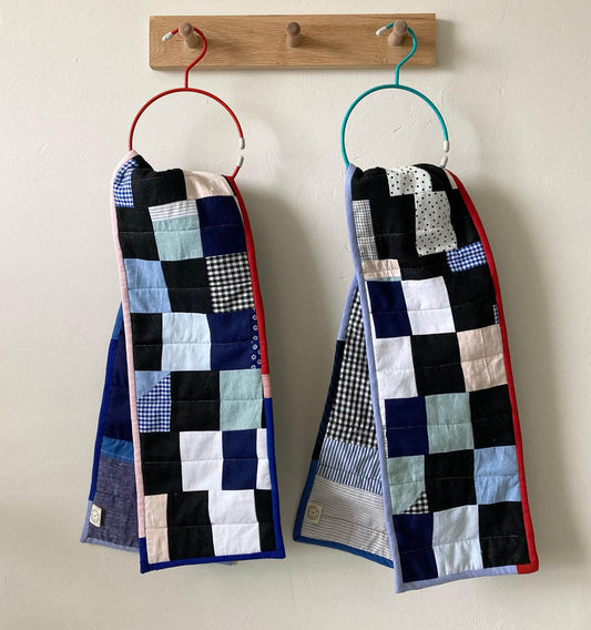 two patchwork quilted scarves made from reclaimed cotton fabrics