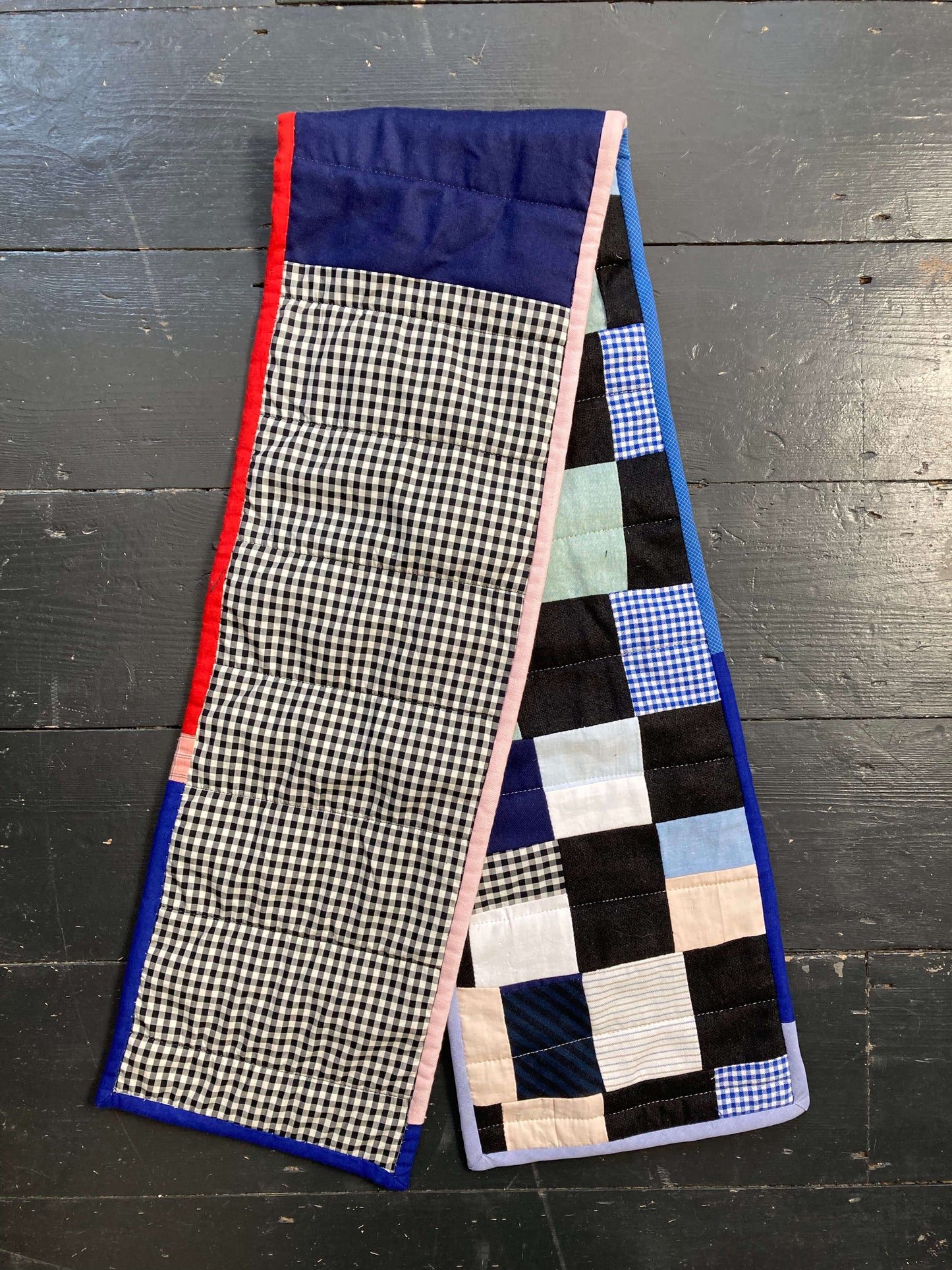 patchwork quilted scarf made from reclaimed cotton fabrics, image shows the back and the front