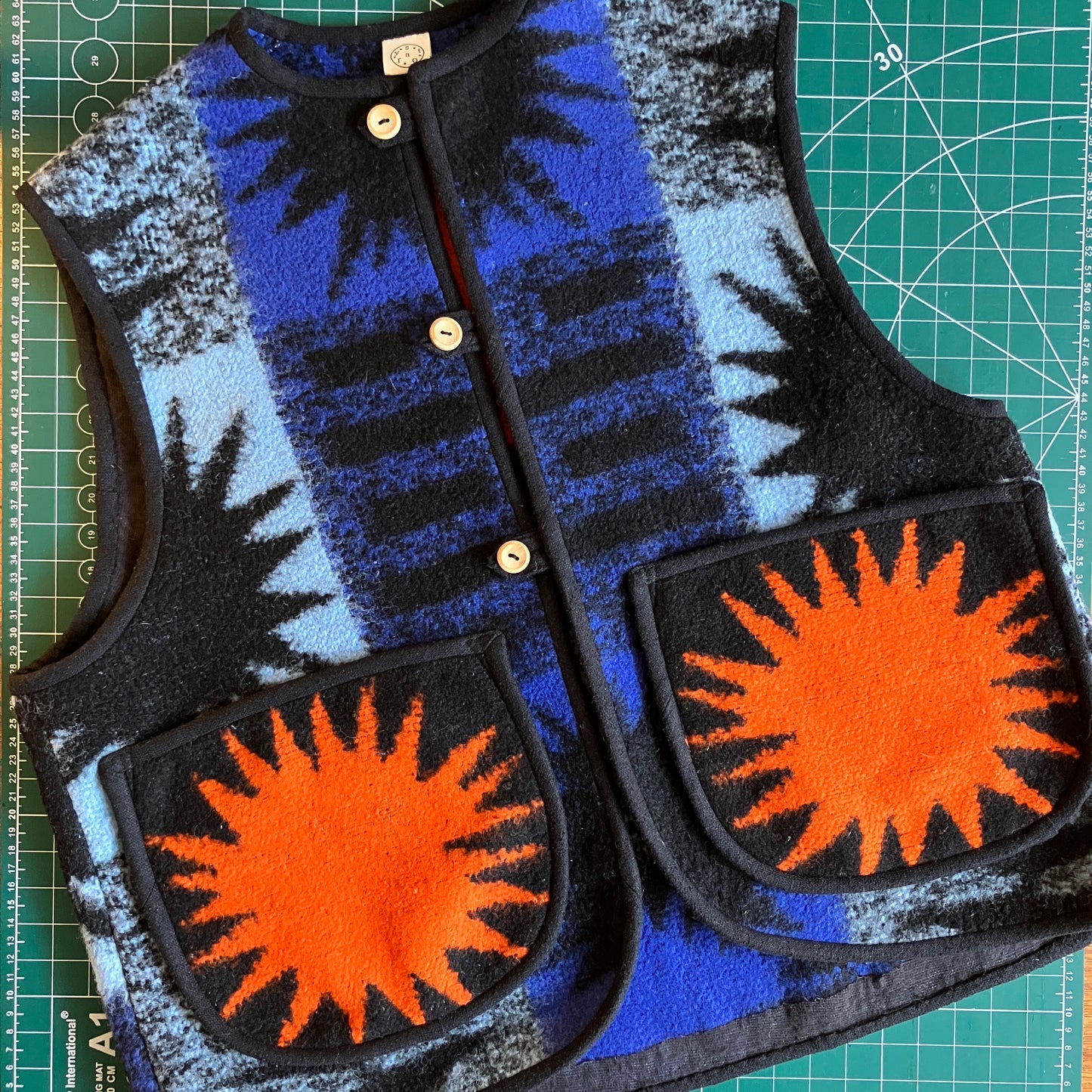 Handmade star pocket reclaimed blanket vest